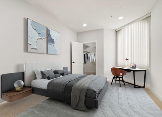 a bedroom with a bed and a desk at Burton, Los Angeles, CA, 90048