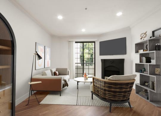 a living room with a couch and a chair and a fireplace at Burton, Los Angeles, California