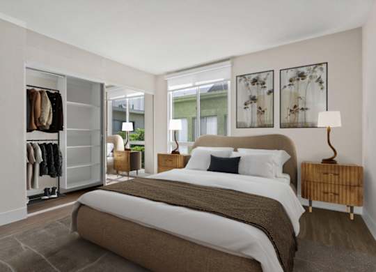 A bedroom with a large bed and a wardrobe at Rochester Apartments, California
