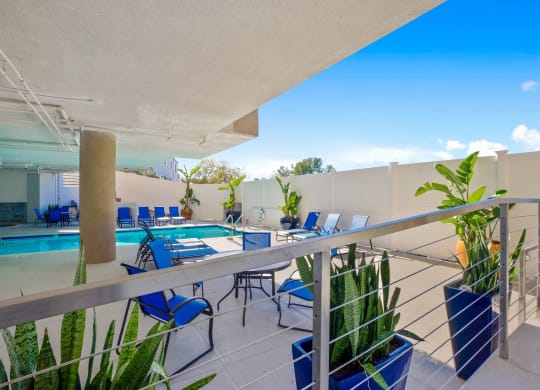 Pool side sitting area1at Midvale Apartments, California, 90024