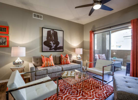 wooden table and sofa at Milan Apartment Townhomes, Las Vegas, NV