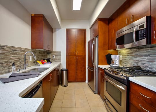Spacious Kitchen With Pantry Cabinet at The Adler Apartments, Los Angeles, CA, 90025
