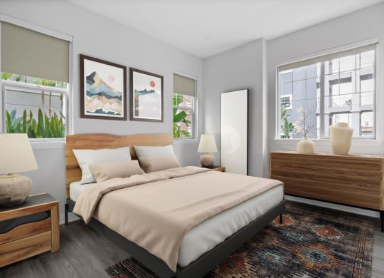 a bedroom with a bed and two windows at The Adler Apartments, Los Angeles, CA