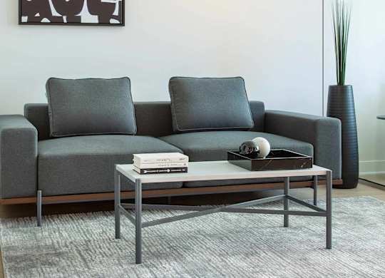 Living Room Couch Coffee Table at Wilshire Margot, California, 90024