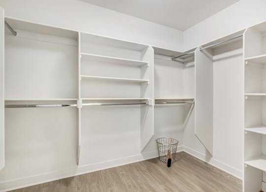 A white closet with shelves at Wilshire Margot, Los Angeles, CA 