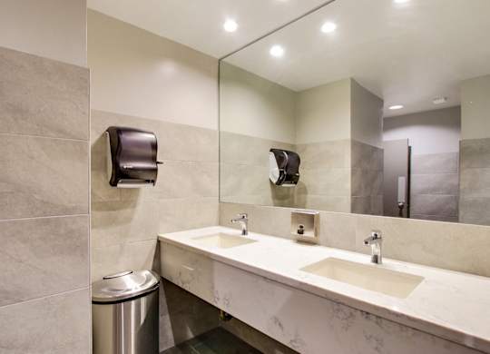 Renovated Bathroom with quartz countertops, recessed lightings