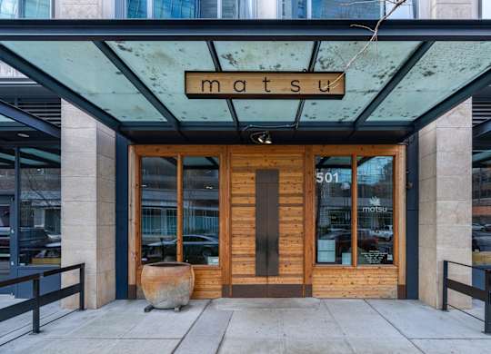 the front of the mastu building in the city