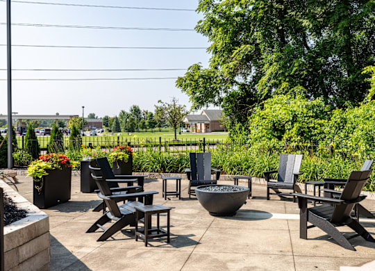 Patio with firepit at Hidden Lakes Apartments, Clarkston, MI