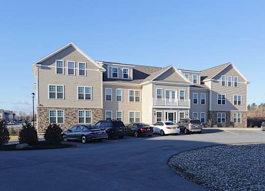 Large Building Exterior with Parking at Iroquois Village, Niskayuna, 12309