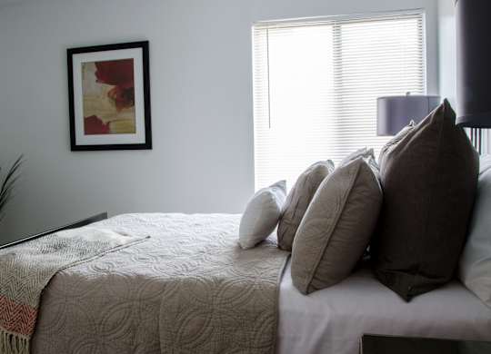 Cozy bed at Pine Ridge Apartments, Rochester Hills, Michigan