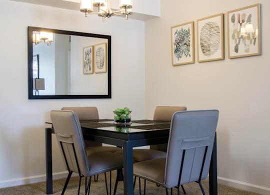 Dining Table with chairs at Pine Ridge Apartments, Rochester Hills, MI