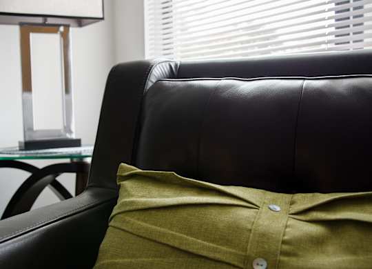 Black couch at Pine Ridge Apartments, Rochester Hills