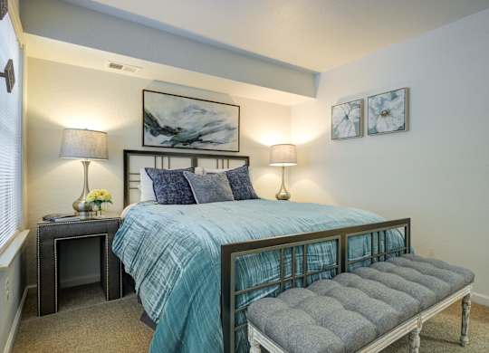 Bedroom with Bed at Hidden Lakes Apartments, Clarkston, MI, 48346