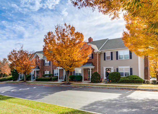 A large house with a driveway in front of it at Highlands at Warwick Apartments, Lilitz, 17543