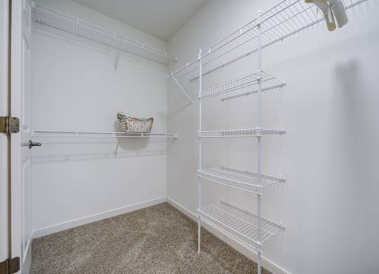 Empty white shelving unit in a room at The Crest at Elm Tree, Mount Joy, PA
