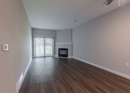 Room with fireplace at Woodland Meadows, Clinton Township, MI