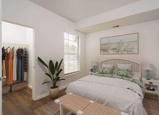 Bedroom with bed and closet at Woodland Meadows, Clinton Township, MI, 48035