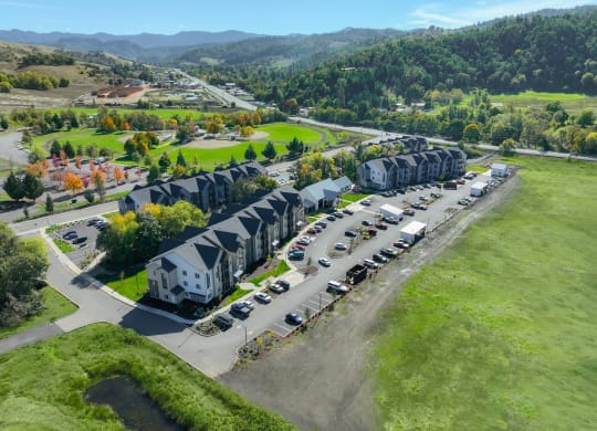 a aerial view of a neighbourhood of houses and a golf course