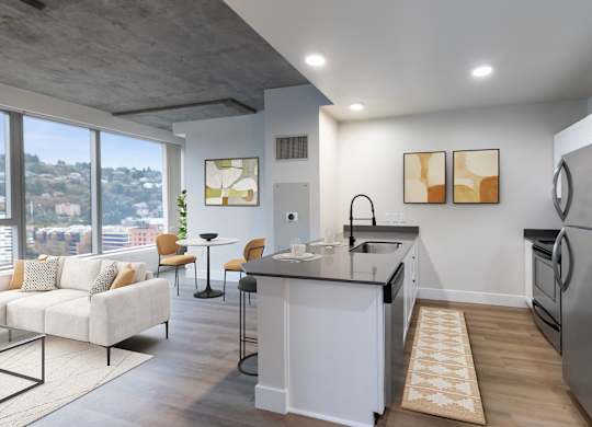 A modern kitchen with a large island and a view of the city.