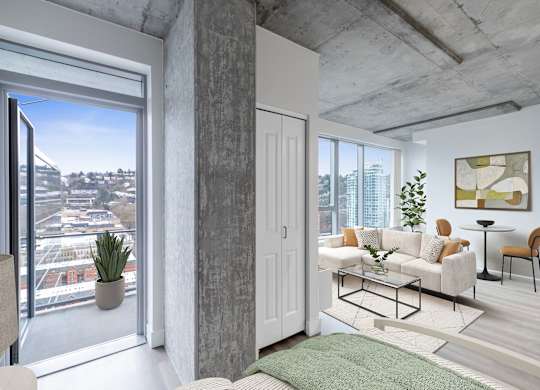 A modern living room with a view of the city.
