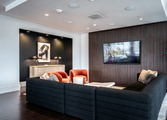 a living room with a couch and a television