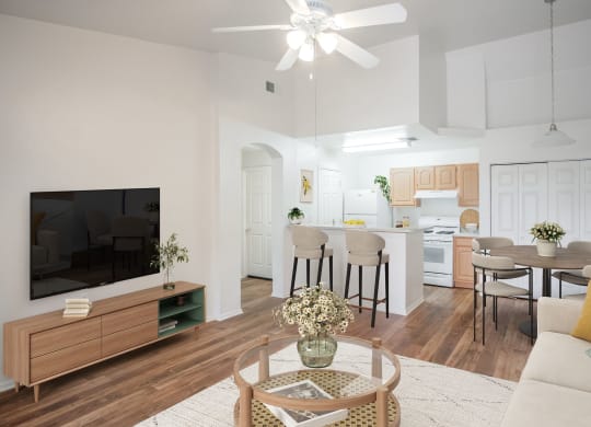 a living room with a couch and a table with chairs