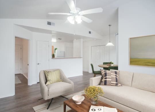 a living room with a couch and a chair