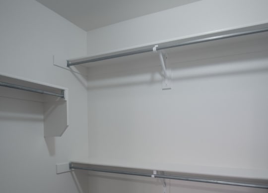 a room with two empty shelves in it