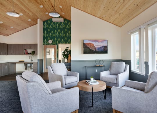 a living room with couches and chairs and a coffee table
