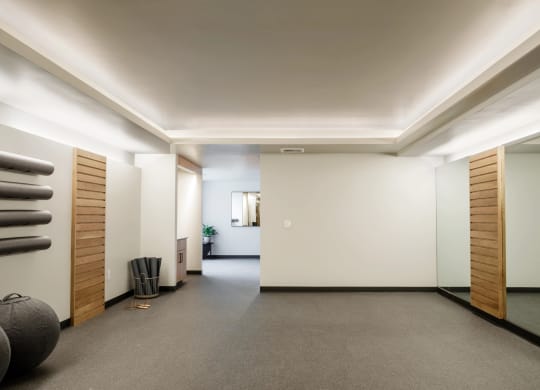 gym with mirrors and equipment at Slabtown Square Apartments, Oregon, 97209