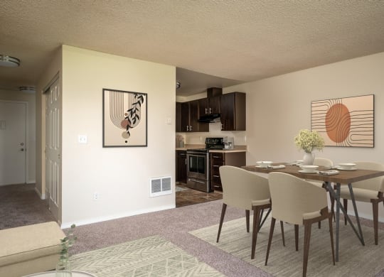 an open living room and dining room with a table and chairs