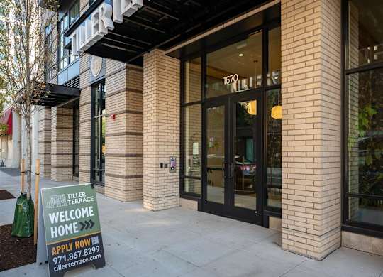 a building with a welcome home sign in front of it