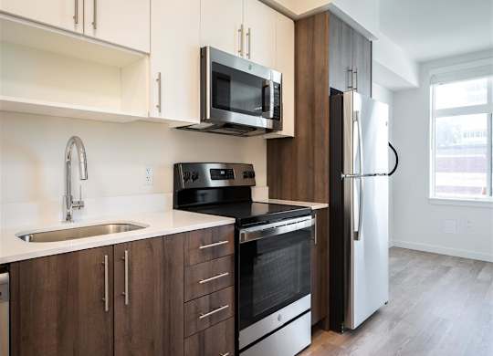 a kitchen with a sink and a door