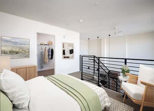 a bedroom with a bed and a balcony