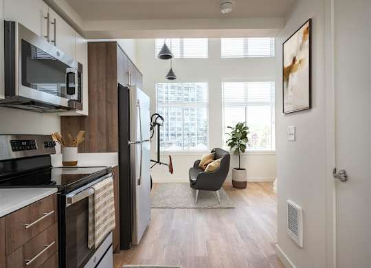 an overhead view of a living room with a bed and a futon
