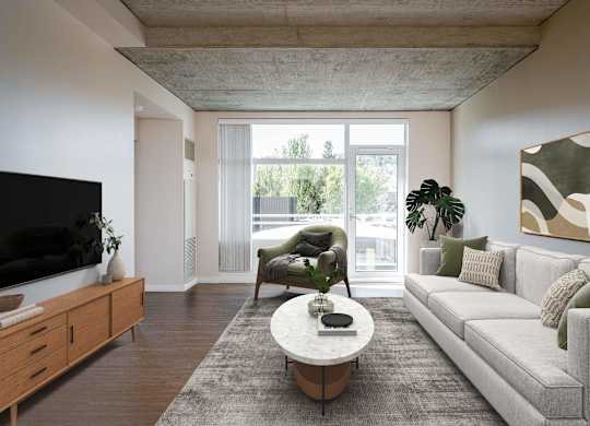 a living room with a white couch and a coffee table and a large window
