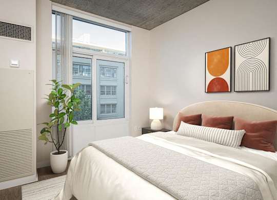 a white bedroom with a bed and a window