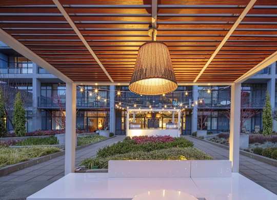 a view of the lobby of a building with a pendant light