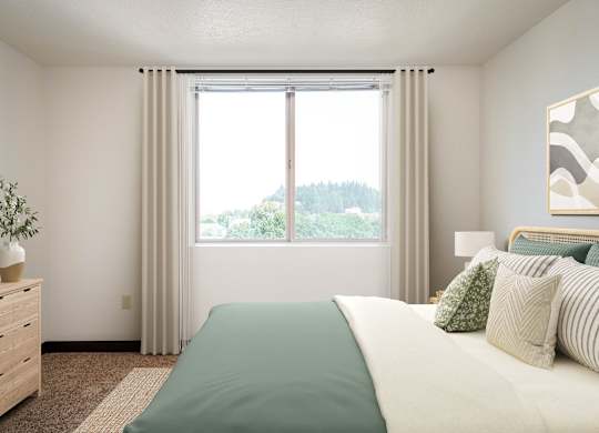 a bedroom with a large window and a bed with pillows