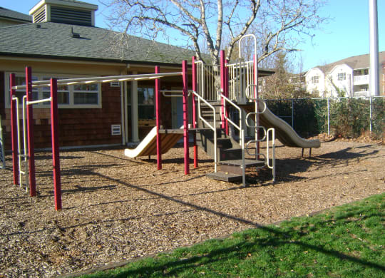 a playground in front of a house