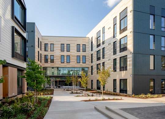 A modern building with a courtyard in the middle.
