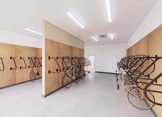 A bike rack with many bicycles parked.