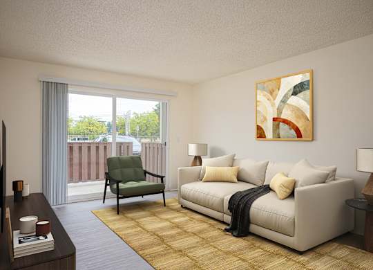 A living room with a couch, chair, and a painting on the wall.