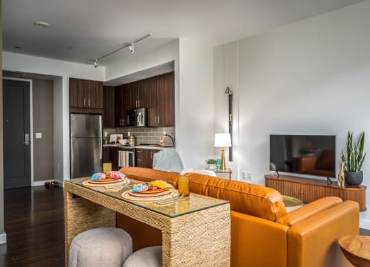 a living room with a couch and a table