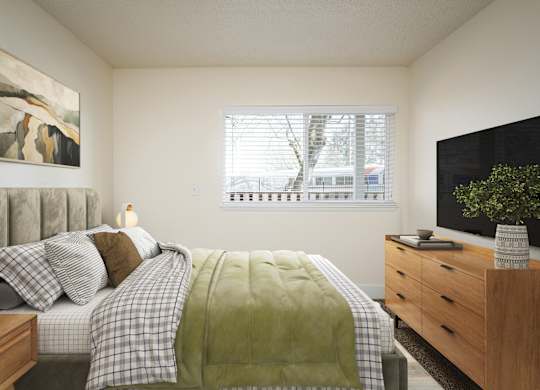 A bedroom with a bed, nightstand, and a painting on the wall.
