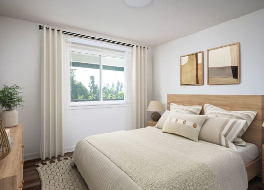 a bedroom with a large bed and a window