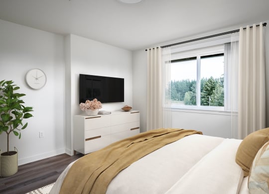 a bedroom with a bed and a large window