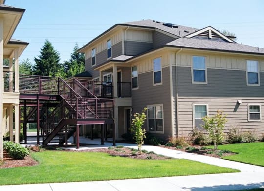 a house with a deck on the side of it