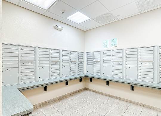 A row of metal lockers in a room.