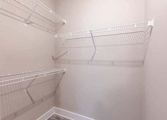 Empty white shelves in a room at Foxwood Apartments, Raleigh-Durham, NC, 27616
